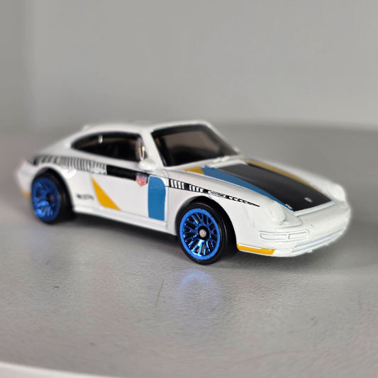 Hot Wheels 96 Porsche Carrera Die-Cast Car Model 1:64 Scale White/Blue/Yellow With Blue Rims Toy