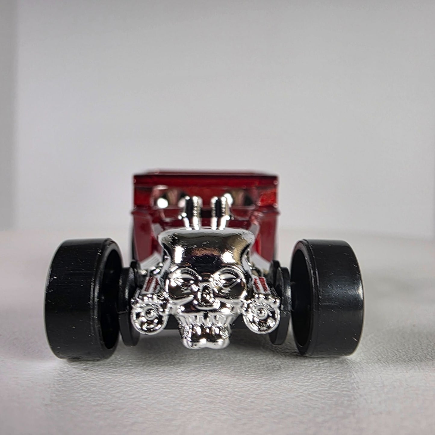 2005 Hot Wheels Bone Shaker Red Die-Cast Car With Skull Grill & Chrome Details
