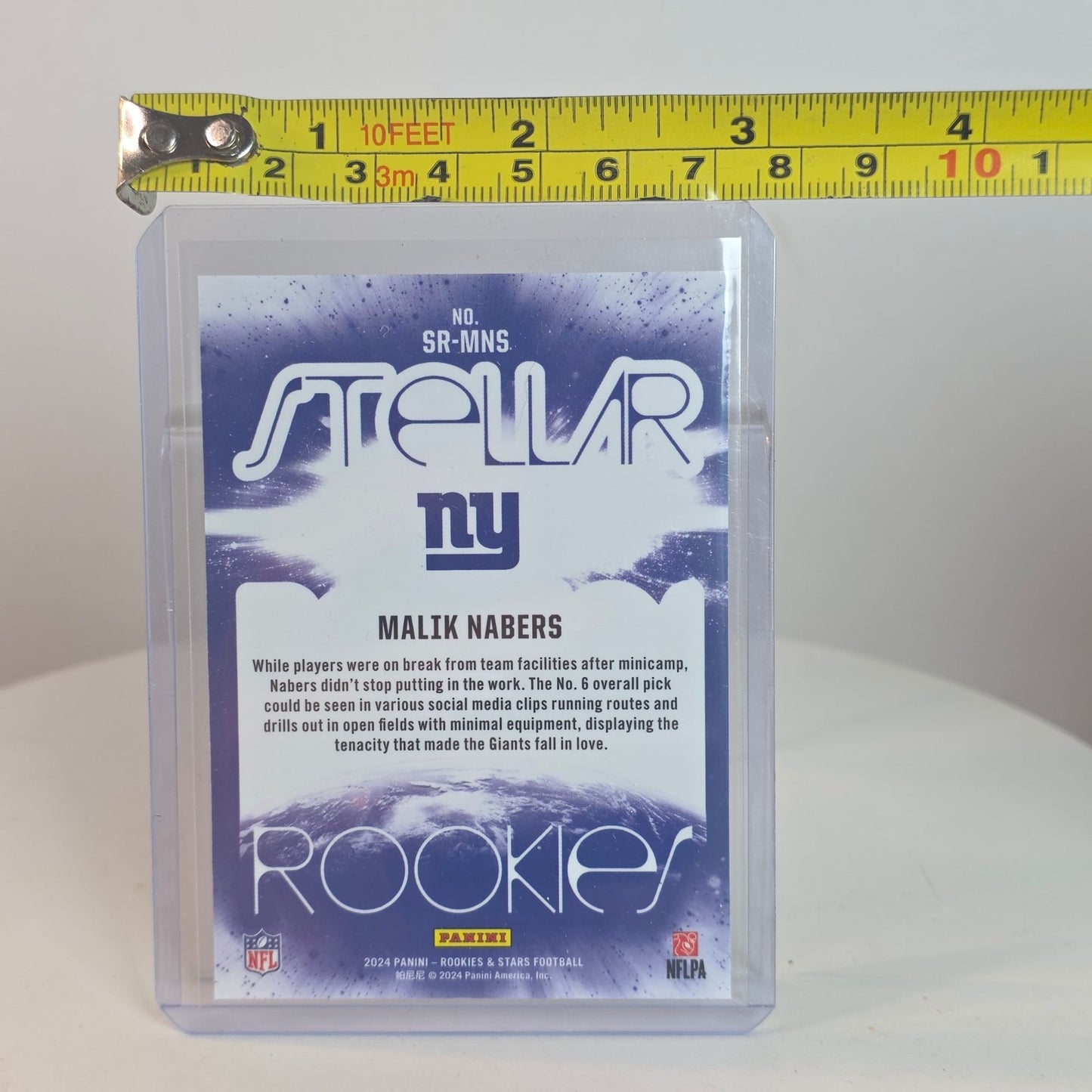 Malik Nabers Rookies & Stars 2024 Panini Stellar Rookies Football Card New York Giants RC Insert Holofoil Design