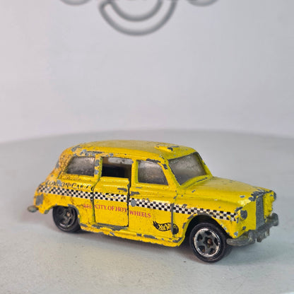 Vintage Hot Wheels London Taxi Yellow Black Checkers London Cab Co. #619 Diecast  I'll