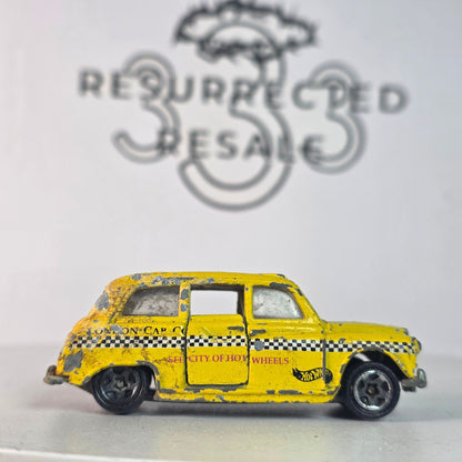 Vintage Hot Wheels London Taxi Yellow Black Checkers London Cab Co. #619 Diecast  I'll