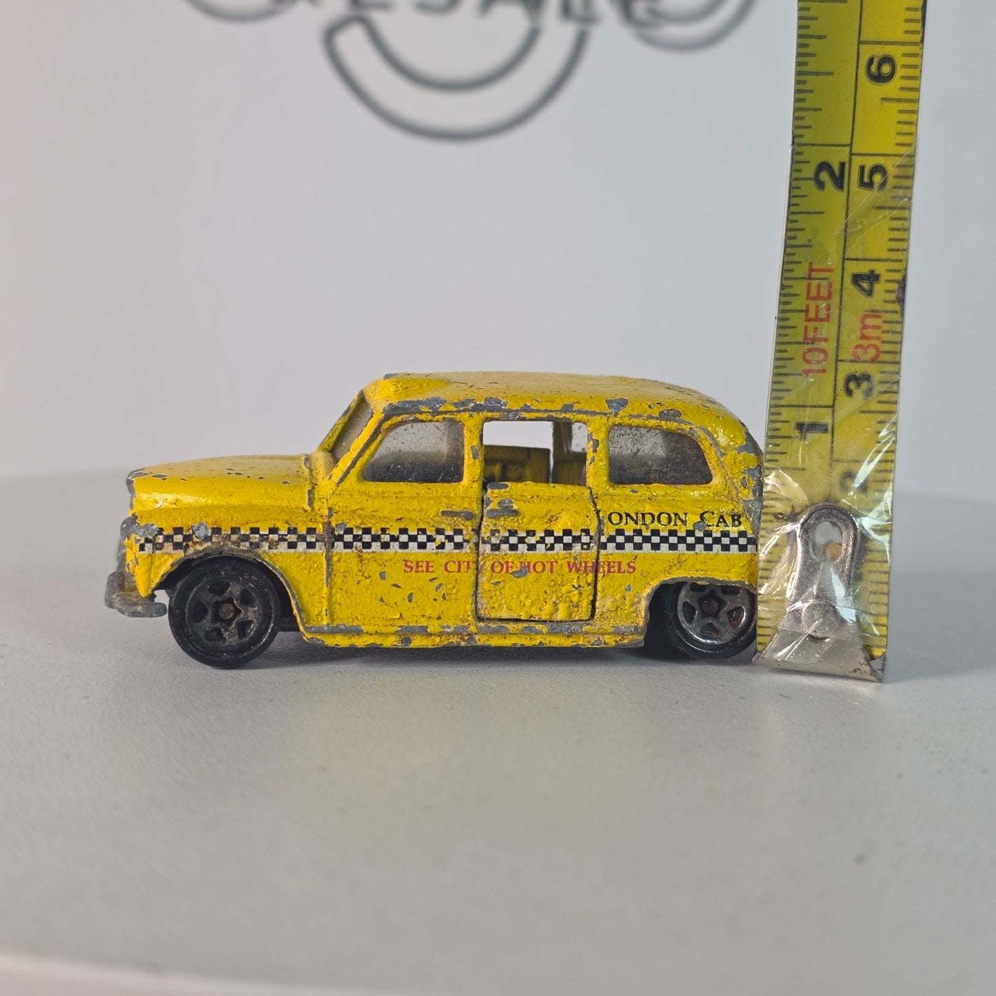 Vintage Hot Wheels London Taxi Yellow Black Checkers London Cab Co. #619 Diecast  I'll