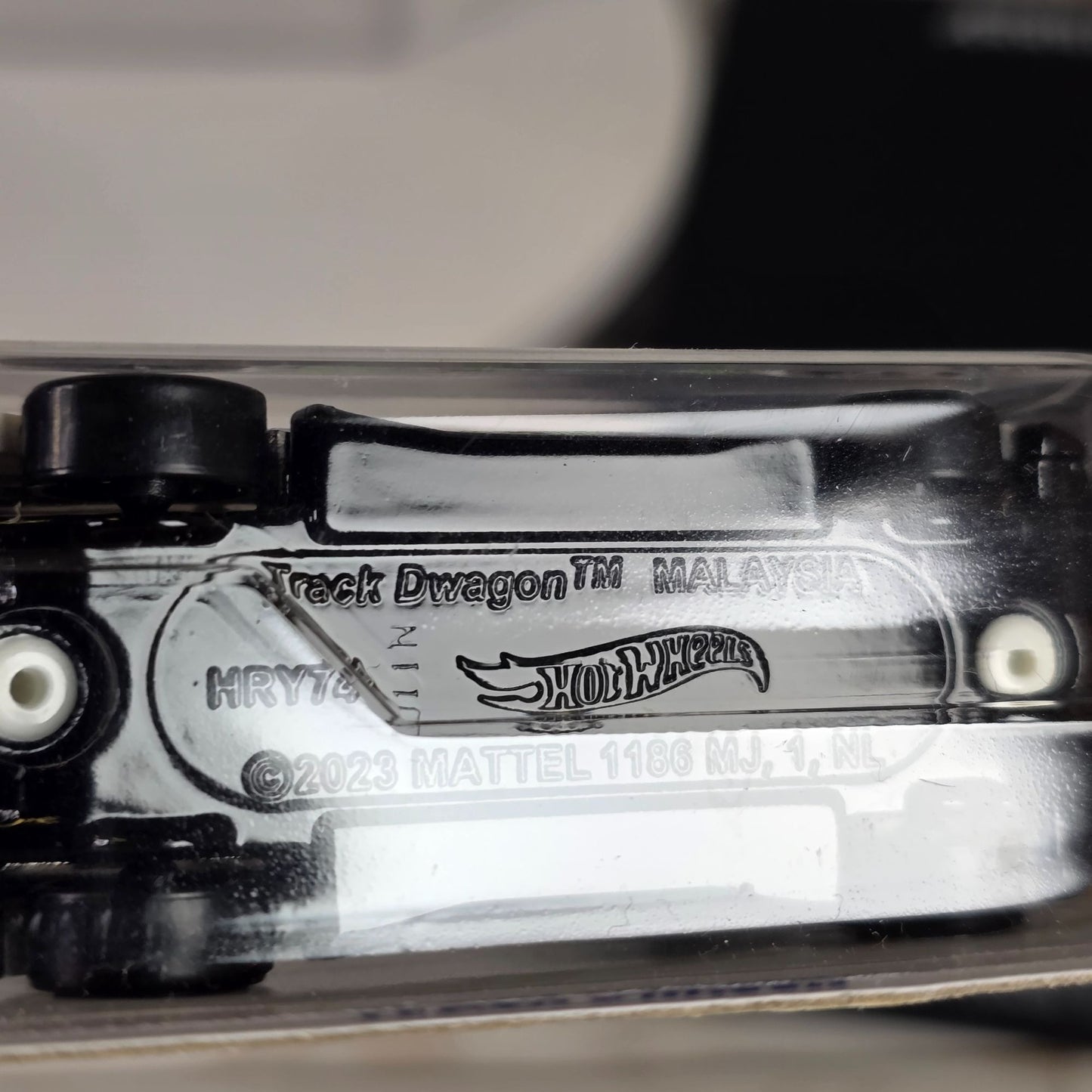 Hot Wheels Track Dwagon 184/250 Diecast Car White W/ Colorful Graphics 2023 Model