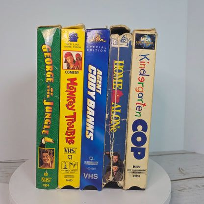 Disneys "George Of The Jungle" & "Monkey Trouble" "Agent Cody Banks" "Home Alone" & "Kindergarten Cop" VHS Lot