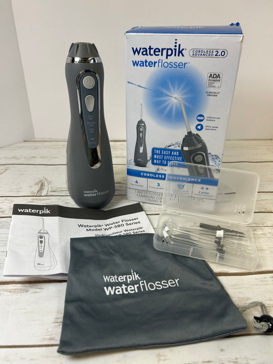 Waterpik Cordless Advanced 2.0 Water Flosser For Teeth, Gums, Braces, Dental Care With Travel Bag and 4 Tips, ADA Accepted, Rechargeable, Portable, and Waterproof, Gray WP-587