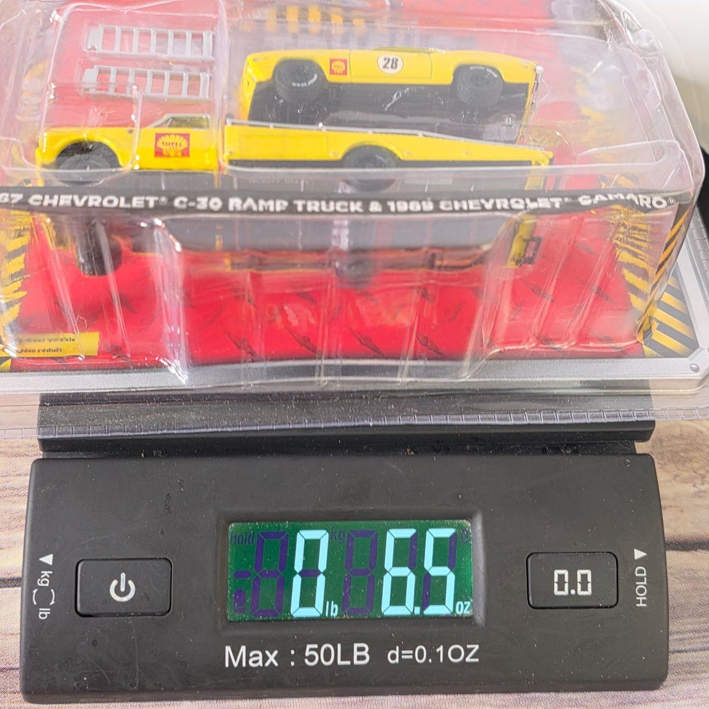 Greenlight 1967 Chevrolet C-30 Ramp Truck & 1969 Chevrolet Camaro 1:64 Scale Diecast Model