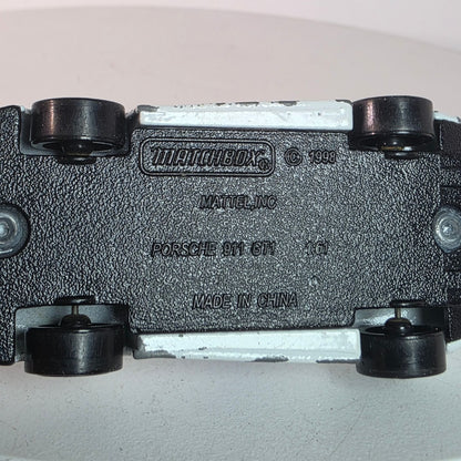 Matchbox Porsche 911 GT1 1998 Casting 2002 50th Anniv White Blue Hood Logo Loose