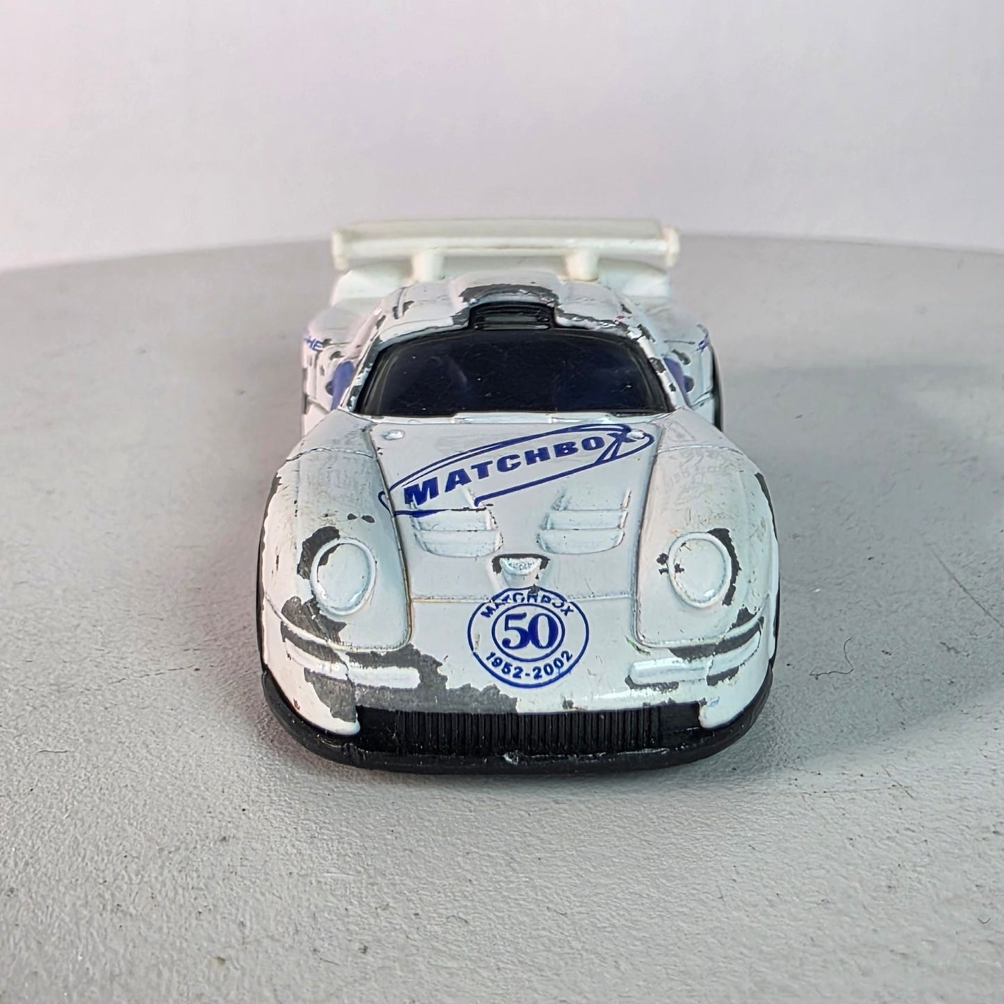Matchbox Porsche 911 GT1 1998 Casting 2002 50th Anniv White Blue Hood Logo Loose