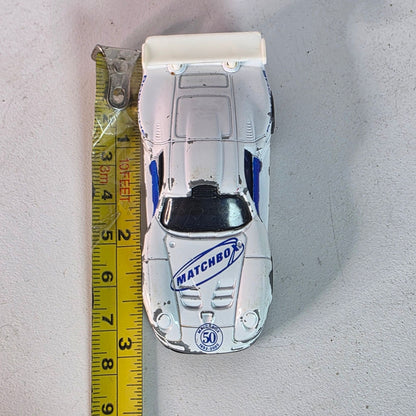 Matchbox Porsche 911 GT1 1998 Casting 2002 50th Anniv White Blue Hood Logo Loose