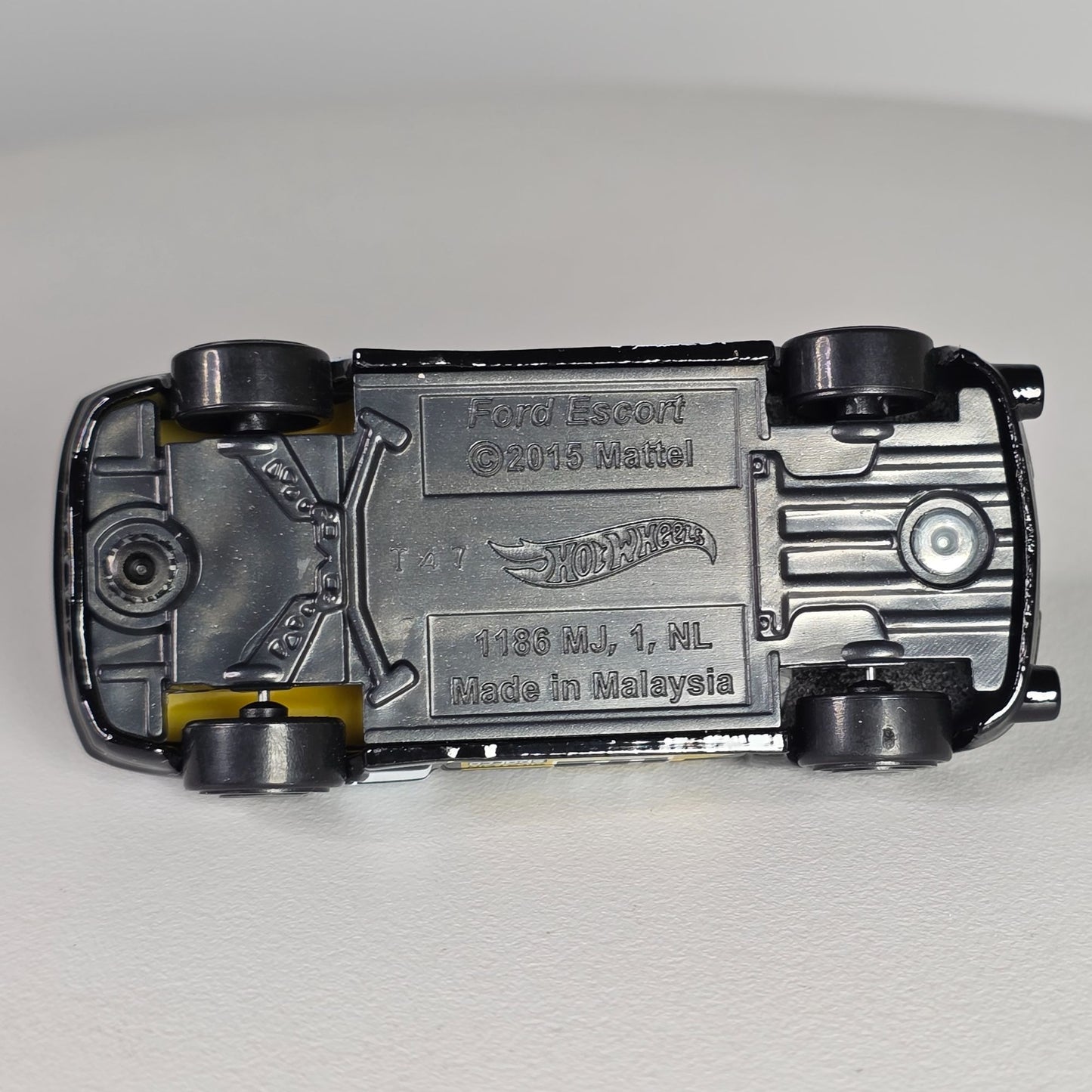 Hot Wheels Ford Escort #17 Black & Yellow Die-Cast Toy Car