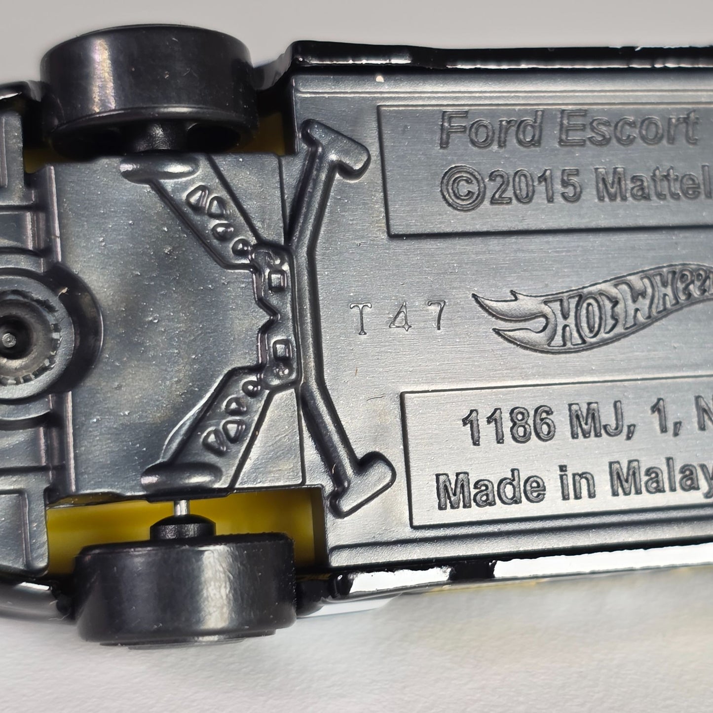 Hot Wheels Ford Escort #17 Black & Yellow Die-Cast Toy Car