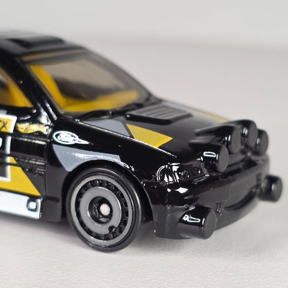 Hot Wheels Ford Escort #17 Black & Yellow Die-Cast Toy Car