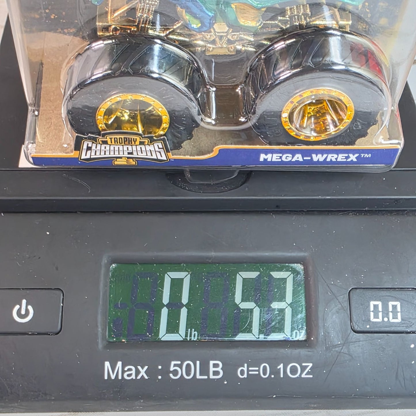 Hot Wheels Monster Trucks Mega-Wrex Trophy Champions Edition With Gold Accents & 50th Bigfoot Logo