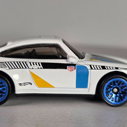 Hot Wheels 96 Porsche Carrera Die-Cast Car Model 1:64 Scale White/Blue/Yellow With Blue Rims Toy