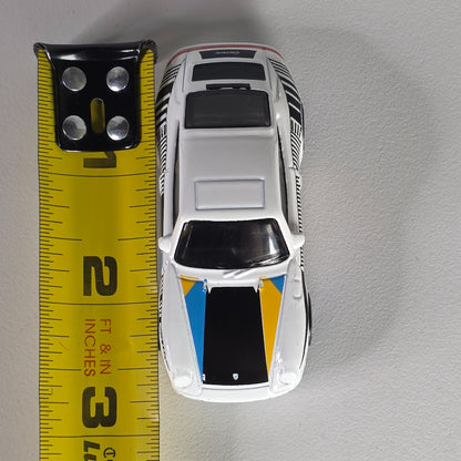Hot Wheels 96 Porsche Carrera Die-Cast Car Model 1:64 Scale White/Blue/Yellow With Blue Rims Toy