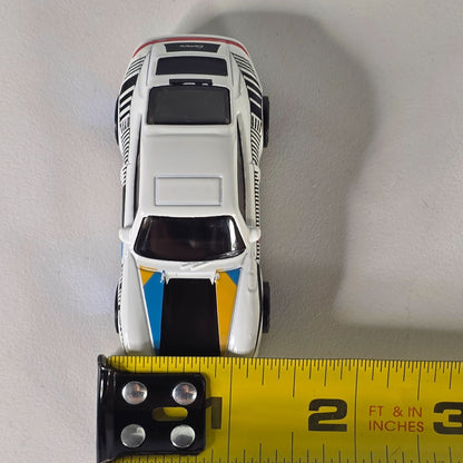 Hot Wheels 96 Porsche Carrera Die-Cast Car Model 1:64 Scale White/Blue/Yellow With Blue Rims Toy