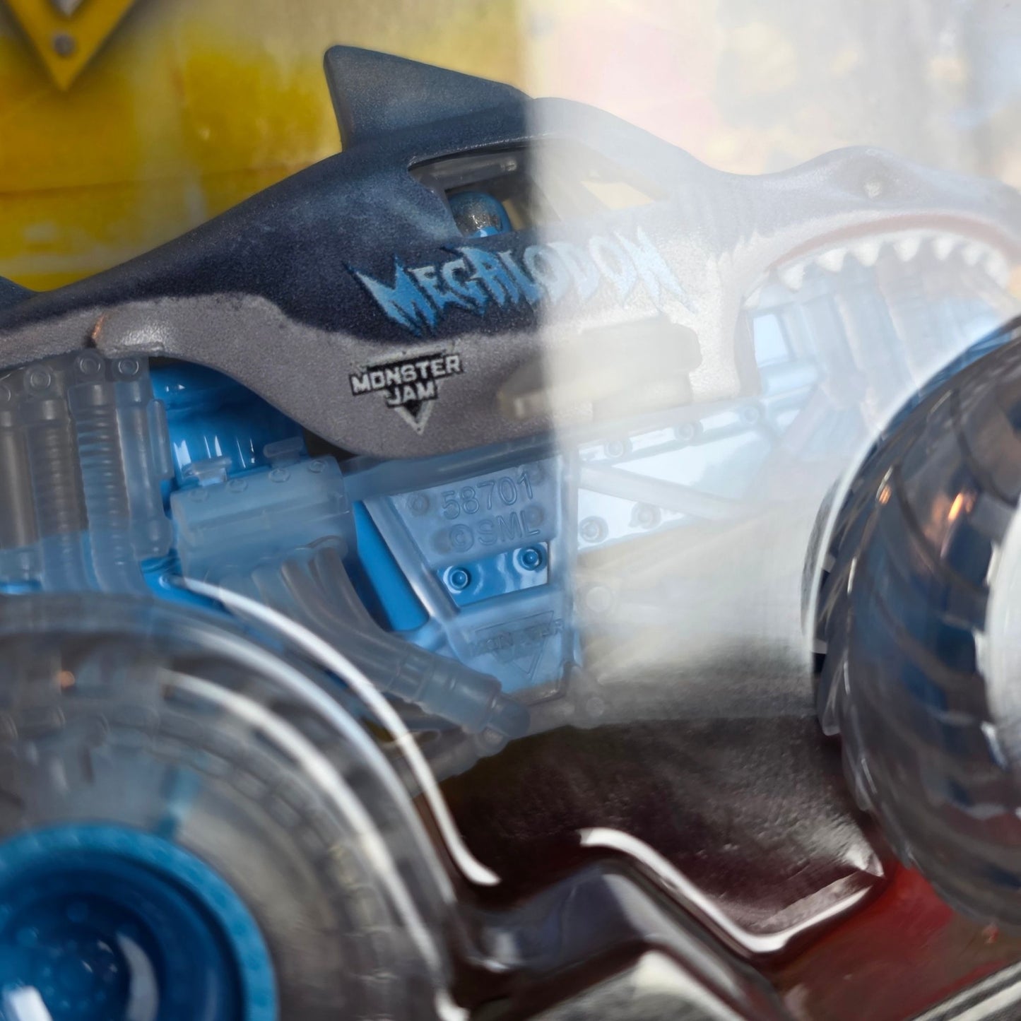 Monster Jam Megalodon Die-Cast Truck 1:64 Scale With Blue Transparent Wheels