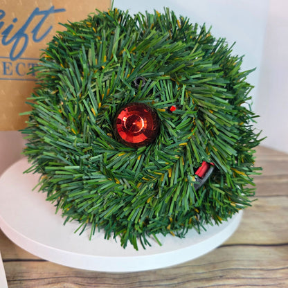 Avon Merry Kissmas Musical Christmas Bell Wreath Ornament