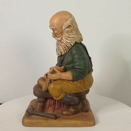 Handcrafted Resin Figurine Of Bearded Artisan Carving Teddy Bear
