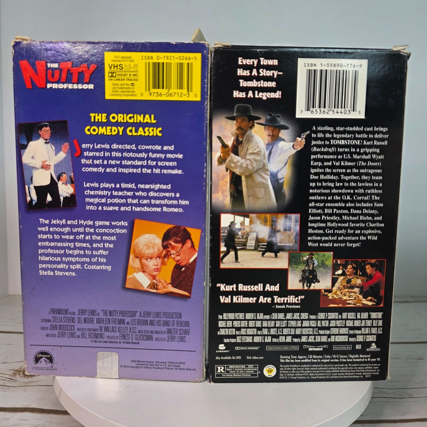 Lot Of 9 VHS Movies Comedy & Western Titles Including Nutty Professor Tombstone Maverick Patch Adams Three Fugitives