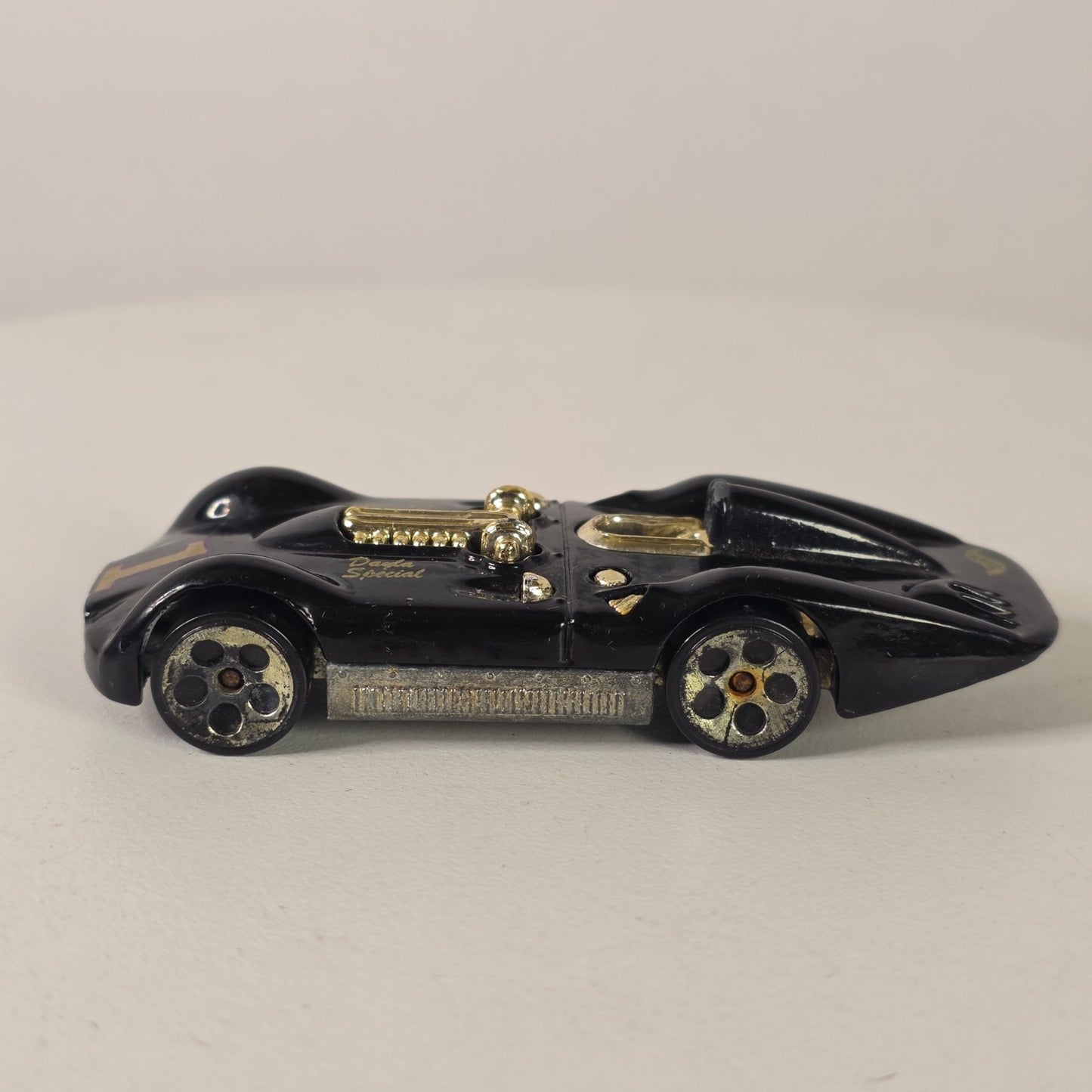 Vintage 1999 Hot Wheels Turbulence "Dayla Special" Black & Gold Diecast Car Metal Bottom