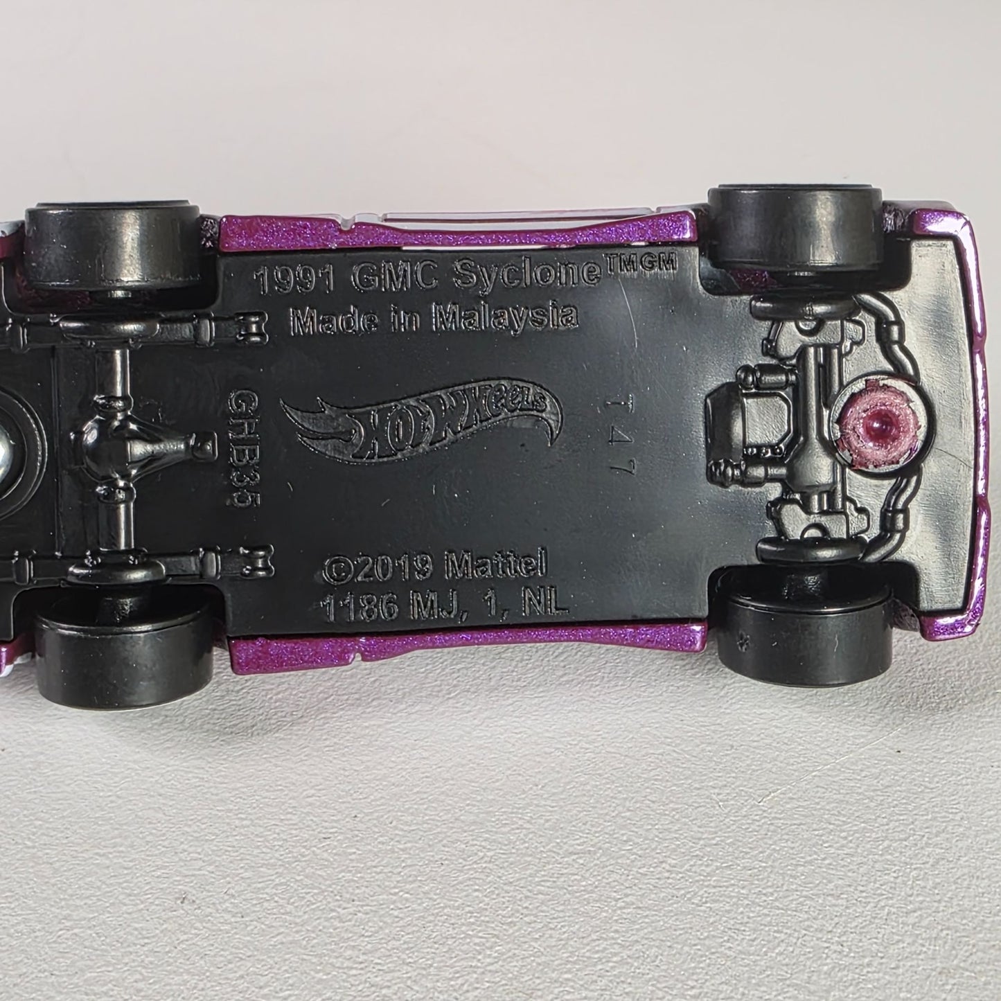 Hot Wheels 1991 GMC Cyclone Purple & White Die-Cast Truck 1:64 Scale