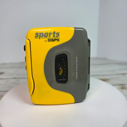 Sports By GPX Cassette Personal Stereo Walkman Style Yellow/Gray Lightweight Portable Music Player With Belt Clip