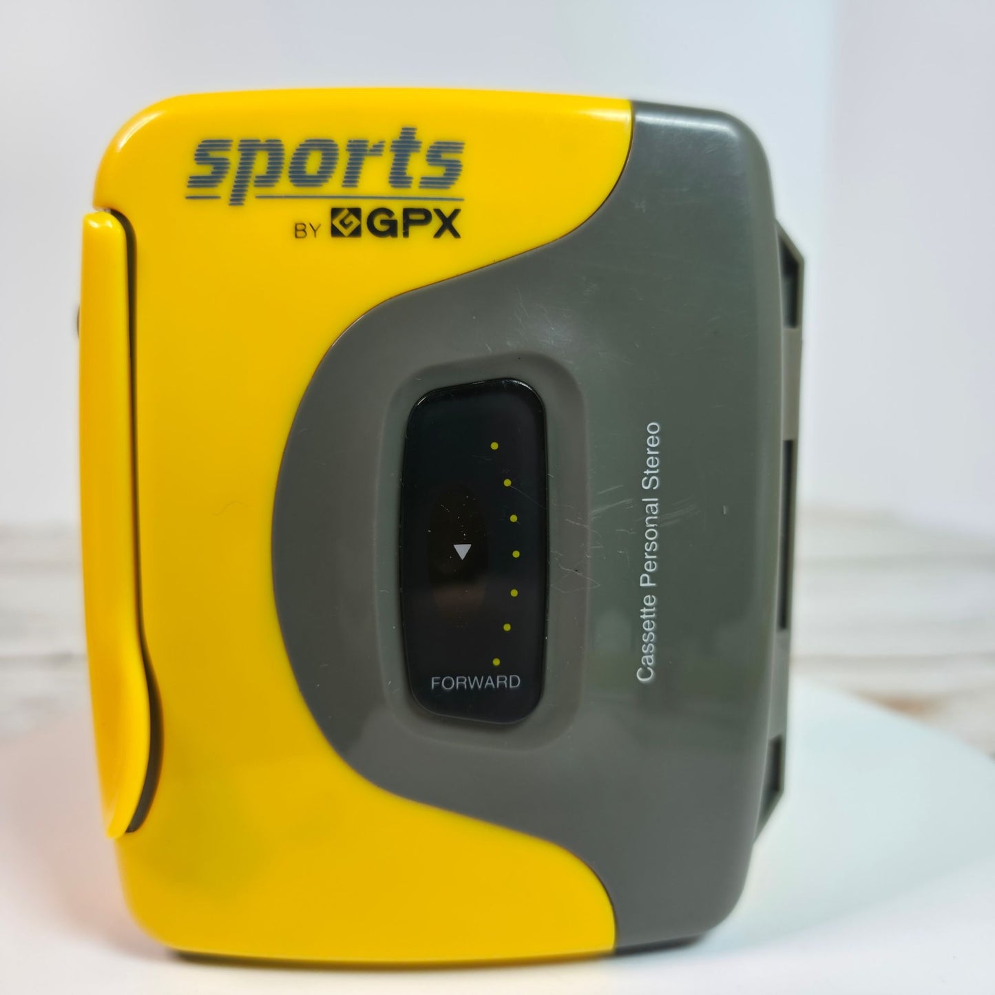 Sports By GPX Cassette Personal Stereo Walkman Style Yellow/Gray Lightweight Portable Music Player With Belt Clip