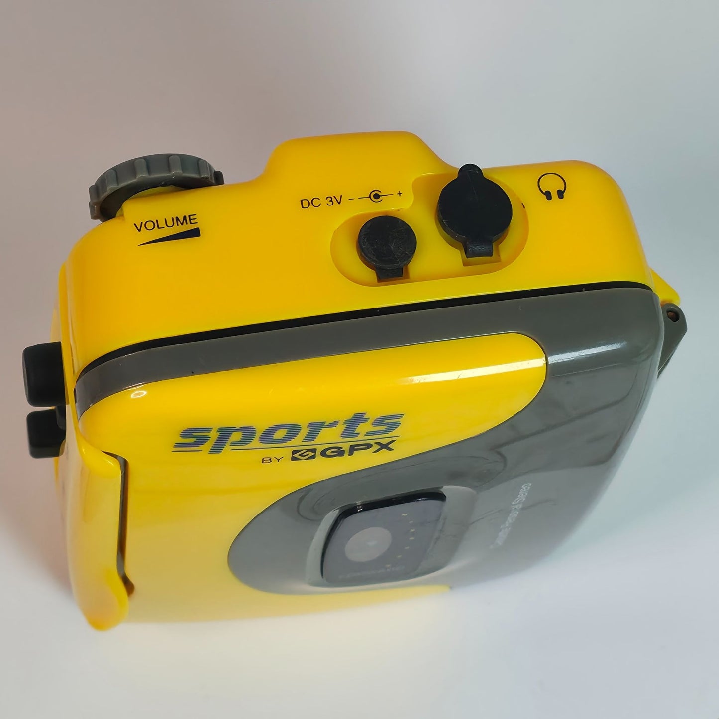 Sports By GPX Cassette Personal Stereo Walkman Style Yellow/Gray Lightweight Portable Music Player With Belt Clip