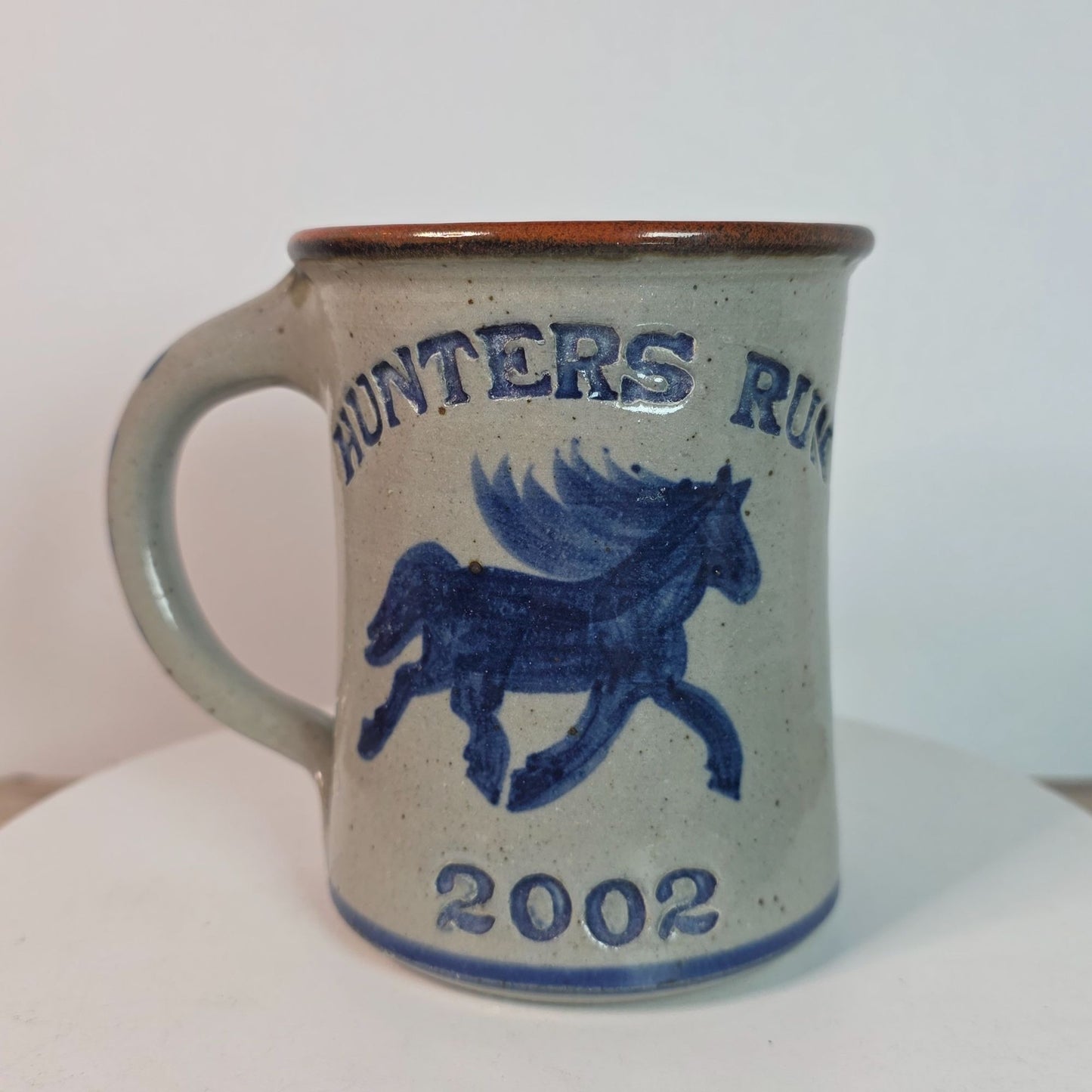 Hunters Run 2002 Blue Horse Stoneware Mug By Dan Harvey