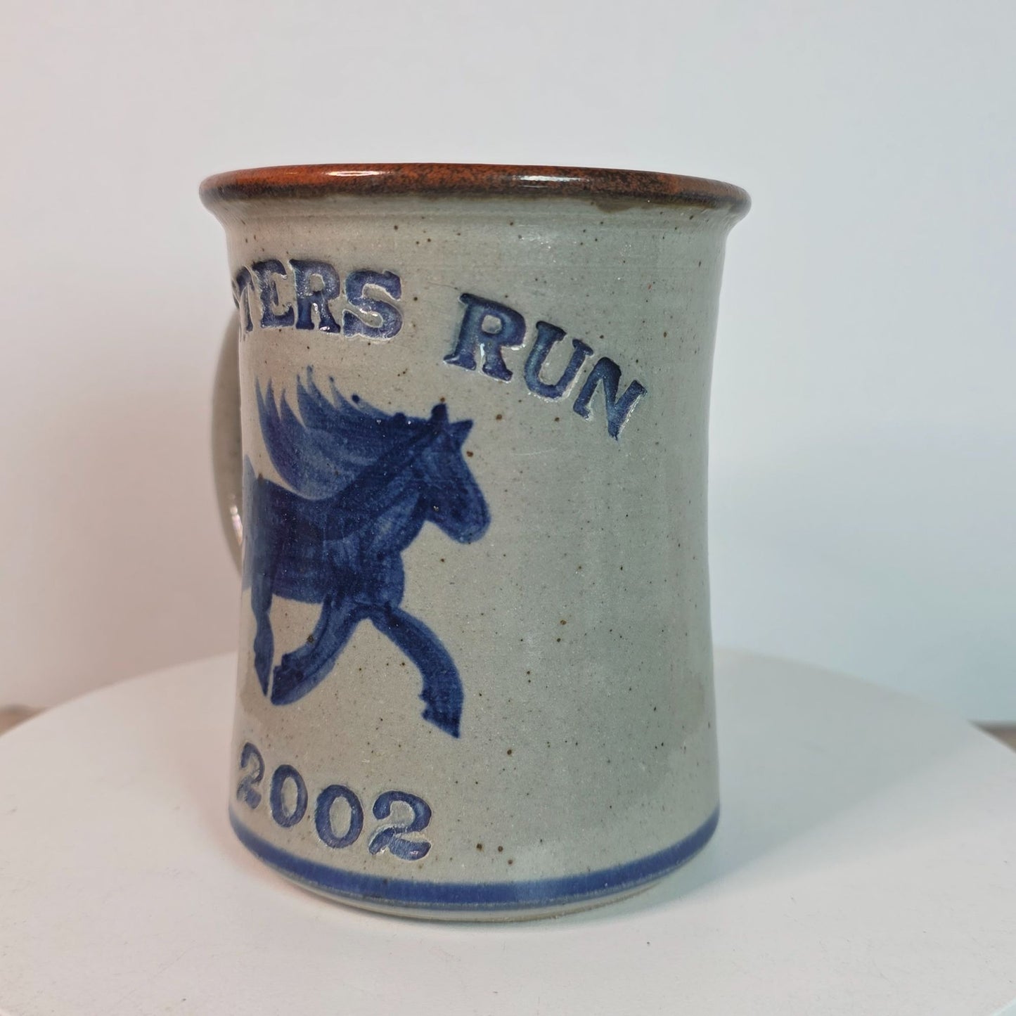 Hunters Run 2002 Blue Horse Stoneware Mug By Dan Harvey