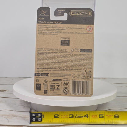 Matchbox Toyota Hilux Pickup Die-Cast Metal Model 35/100 Official Licensed Product 1:64 Scale Blue Collectible Toy Truck