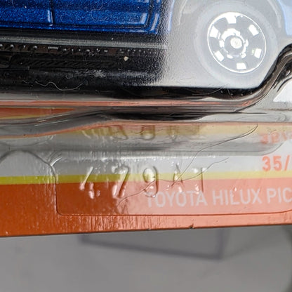 Matchbox Toyota Hilux Pickup Die-Cast Metal Model 35/100 Official Licensed Product 1:64 Scale Blue Collectible Toy Truck