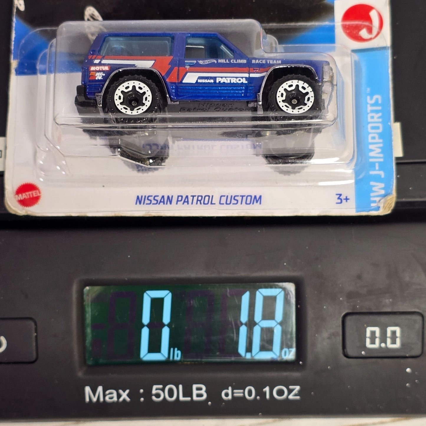 Hot Wheels 2023 Nissan Patrol Custom Die-Cast Toy Car 1/64 Scale Blue & Red