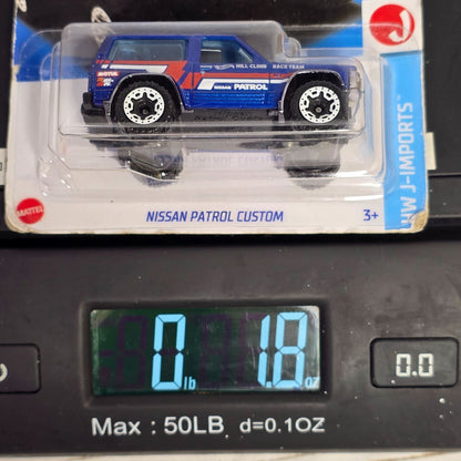 Hot Wheels 2023 Nissan Patrol Custom Die-Cast Toy Car 1/64 Scale Blue & Red