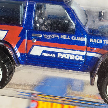 Hot Wheels 2023 Nissan Patrol Custom Die-Cast Toy Car 1/64 Scale Blue & Red